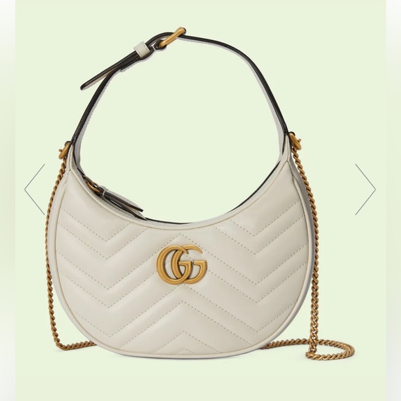 Gucci Handbags - Gucci marmont half moon bag in white *like new